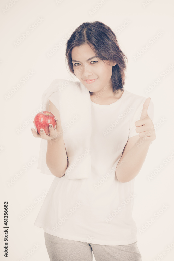 Smiling woman with apple isolated on white Smiling woman with apple isolated on white
