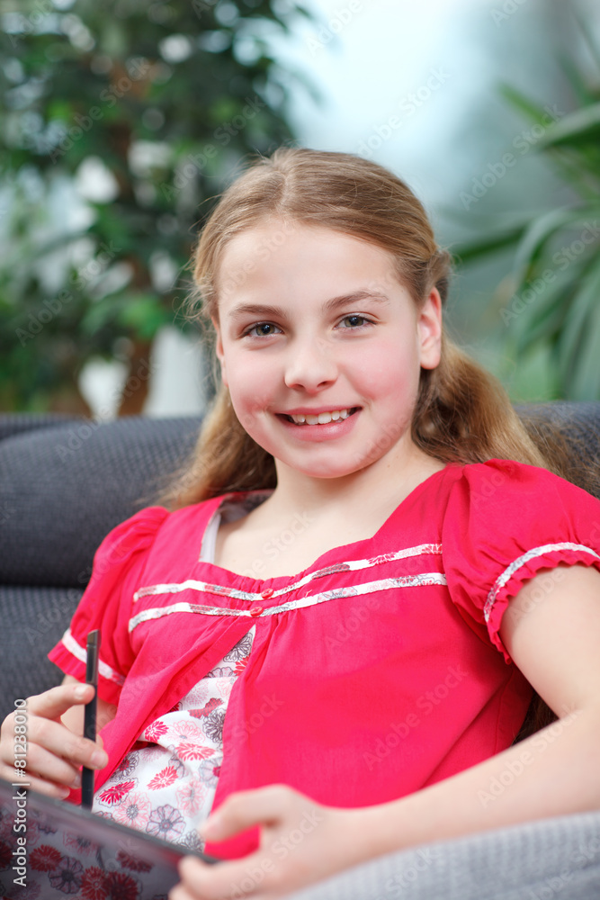 Fototapeta premium young girl with tablet