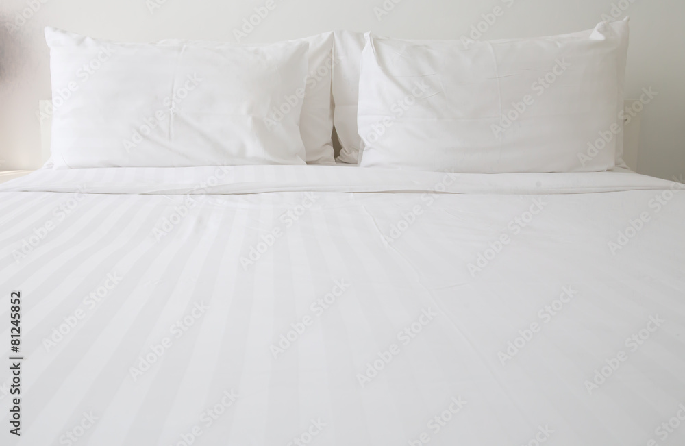 White bed sheets and pillows - obrazy, fototapety, plakaty 