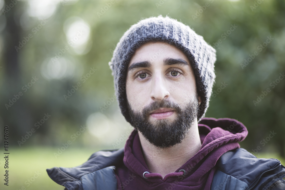 Portrait of trendy guy in the park Portrait of trendy guy in the park