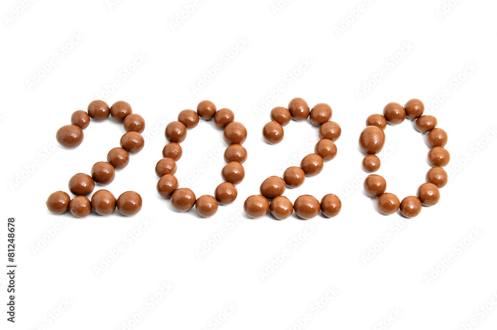 image 2020 of sweet chocolate round on a white background. image 2020 of sweet chocolate round on a white background.