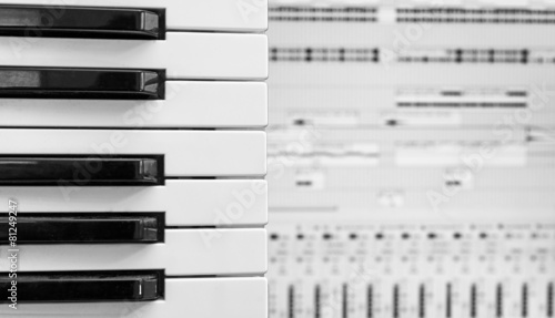 Photography Piano keys over recording software background.