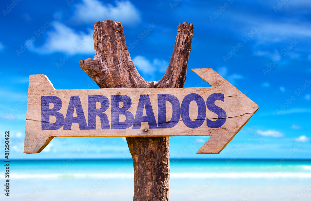 Barbados wooden sign with beach background