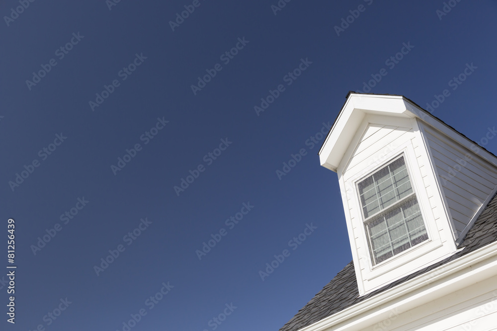 Roof of House and Windows Against Deep Blue Sky Roof of House and Windows Against Deep Blue Sky