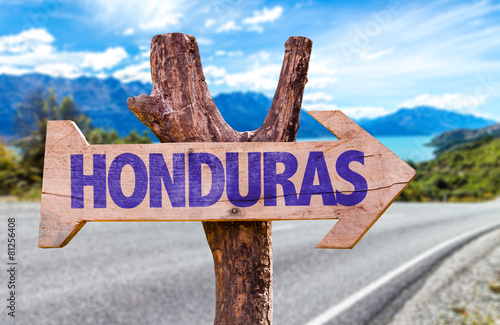 Honduras wooden sign with road background