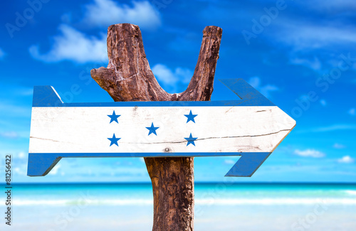 Honduras Flag wooden sign with beach background photo