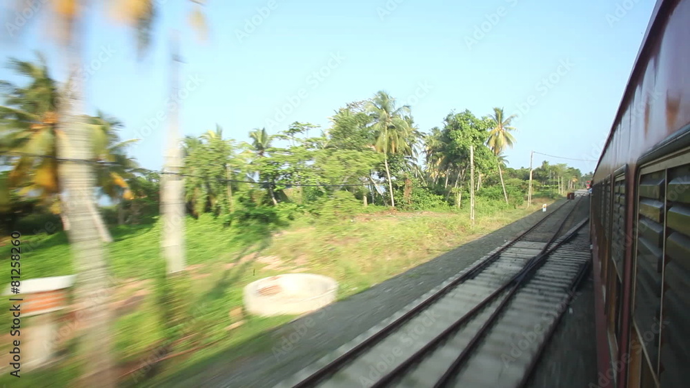 COLOMBO, SRI LANKA - FEBRUARY 2014: View of Colombo suburbs from passing train. The Sri Lankan railway transports millions of people daily in the country.
COLOMBO, SRI LANKA - FEBRUARY 2014: View of Colombo suburbs from passing train. The Sri Lankan railway transports millions of people daily in the country.