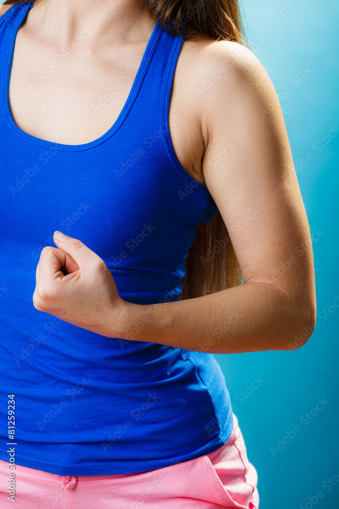 Slim fit woman part body on blue. Slim fit woman part body on blue.