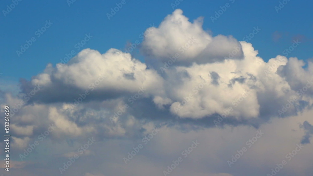 white fluffy clouds over blue sky white fluffy clouds over blue sky
