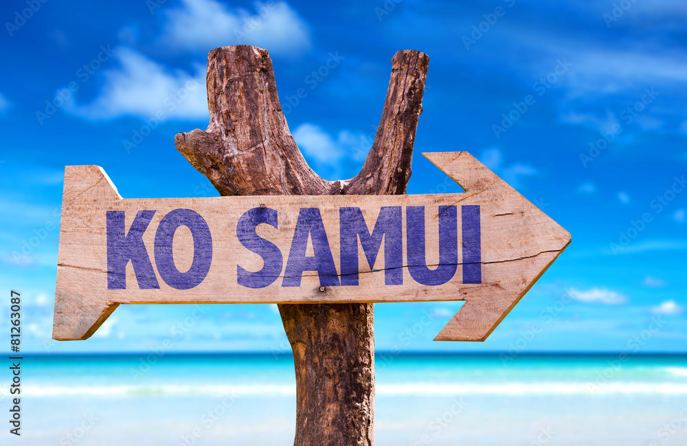 Ko Samui wooden sign with beach background