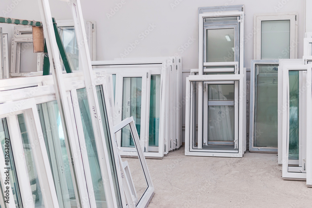 Set of PVC Windows in a Factory Interrior - obrazy, fototapety, plakaty 