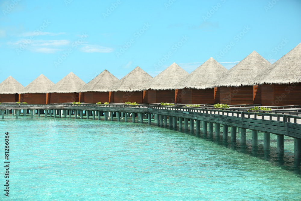 Fototapeta premium Water villas over blue ocean in baros Maldives