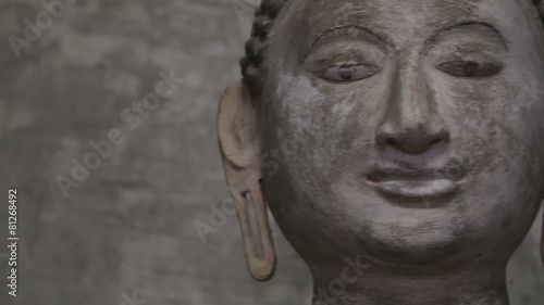 DAMBULLA, SRI LANKA - FEBRUARY 2014: Close up view of sitting Buddha at the Golden Temple of Dambulla. The Golden Temple of Dambulla is a World Heritage Site in Sri Lanka.