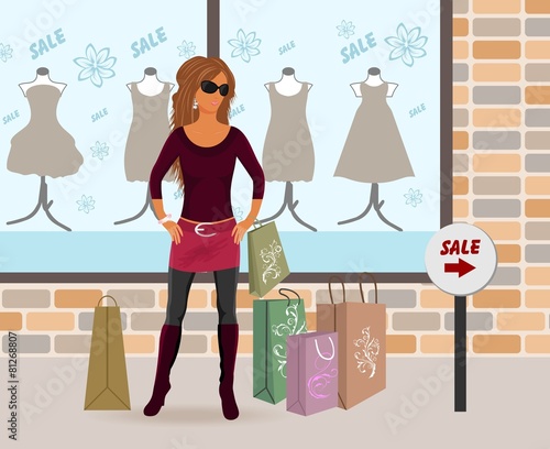 modern girl loaded with shopping bags