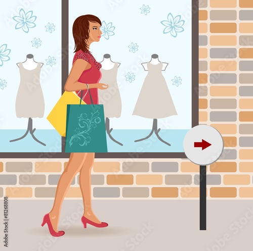 modern girl loaded with shopping bags