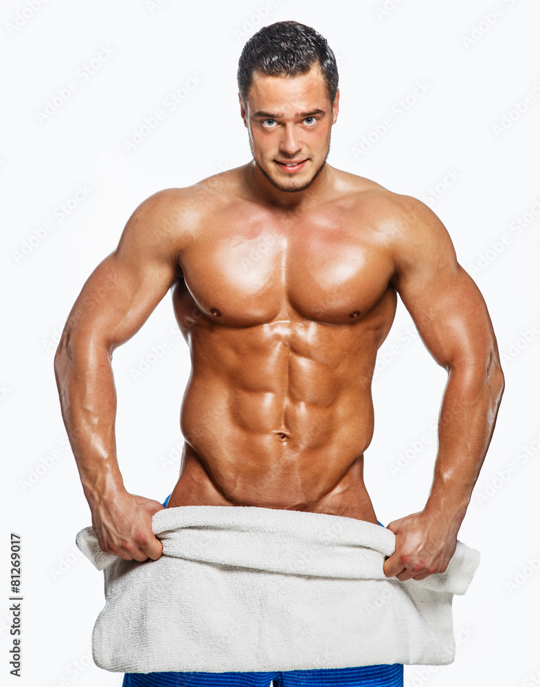 Fototapeta premium Fitness man posing in studio