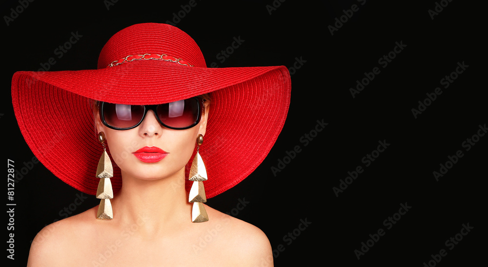Woman in red hat and sunglasses over black Woman in red hat and sunglasses over black