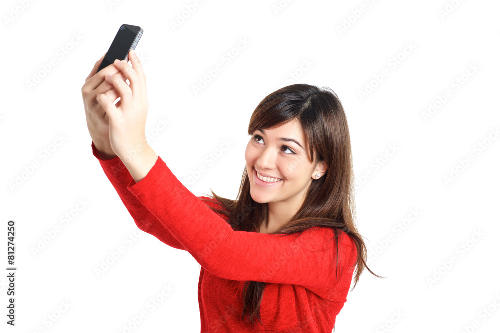 Asian girl taking a selfie with her phone Asian girl taking a selfie with her phone