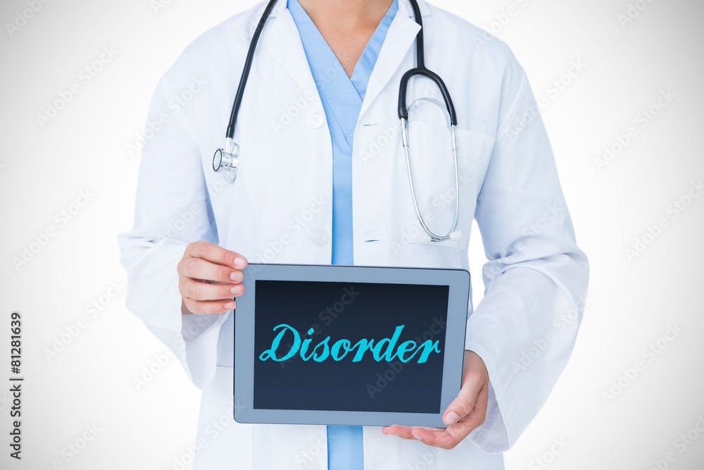 Disorder against doctor showing tablet pc Disorder against doctor showing tablet pc