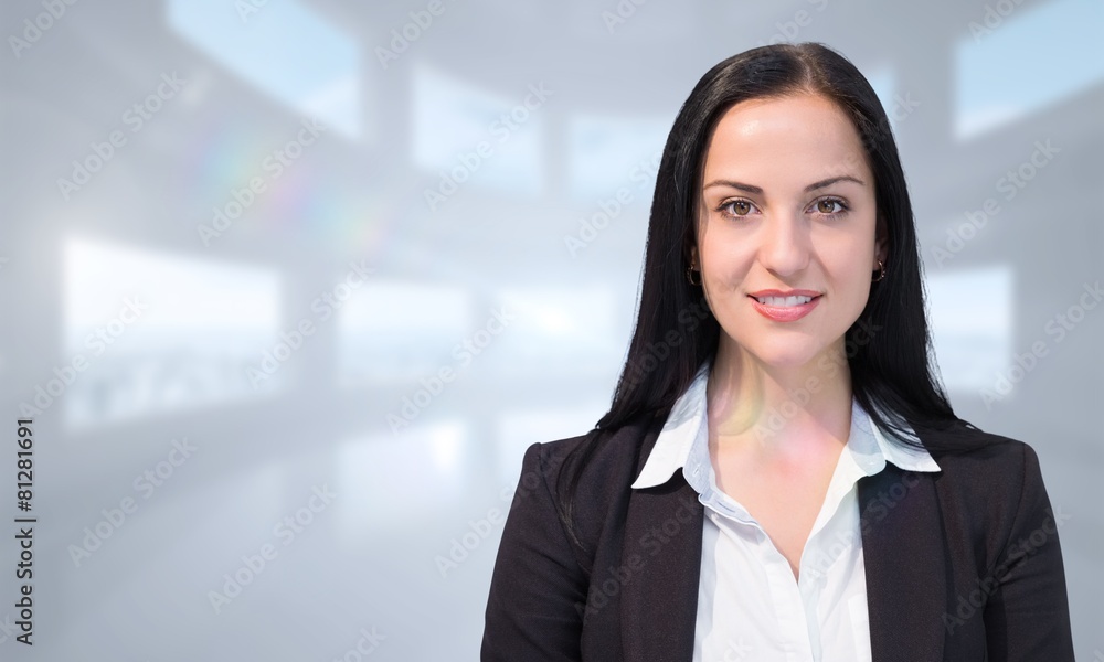 Composite image of pretty businesswoman smiling at camera Composite image of pretty businesswoman smiling at camera