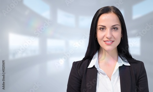 Free Download Composite image of pretty businesswoman smiling at camera - GFXLoad
