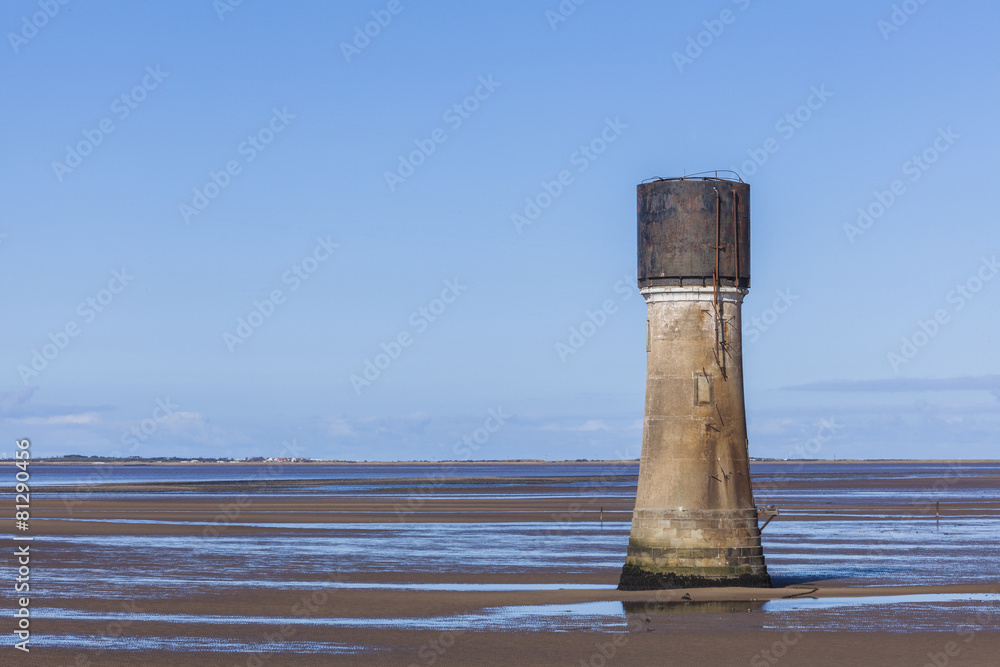 Concrete tower construction on Spurn Point Beach UK Concrete tower construction on Spurn Point Beach UK