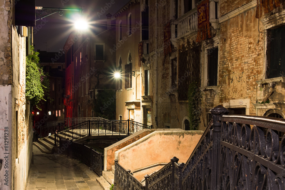 Night street with bridges in Venice