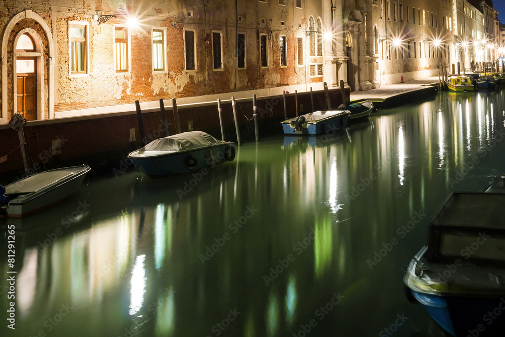 Night scene with boats in channel, Venice