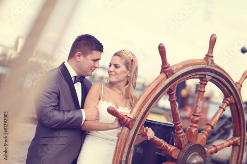 Bride and groom on a boat