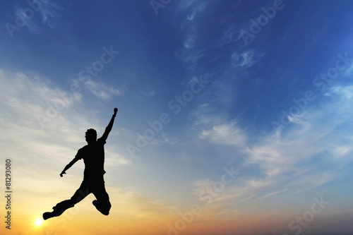 Wallpaper Mural Silhouette of jumping man and beautiful sunset Torontodigital.ca