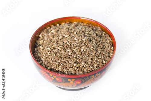 Flax seeds in a wooden bowl
