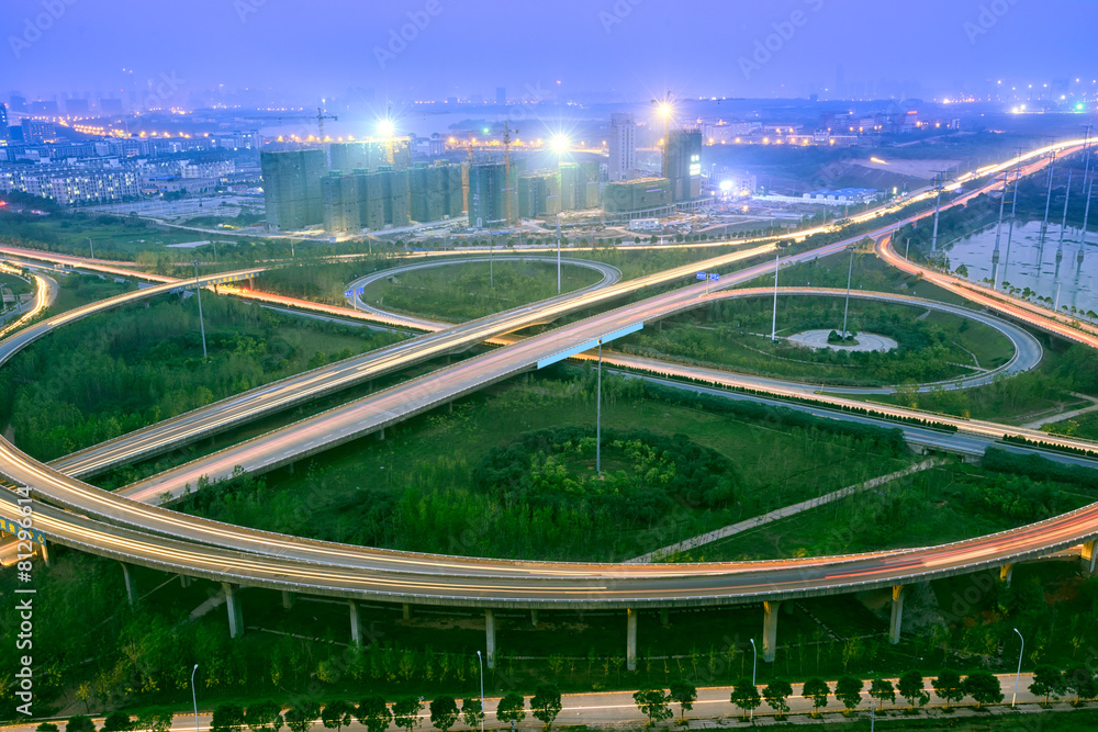 Naklejka night view of the bridge and city in shanghai china