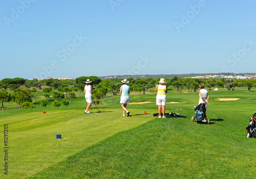 Group of women friends playing golf, Spain