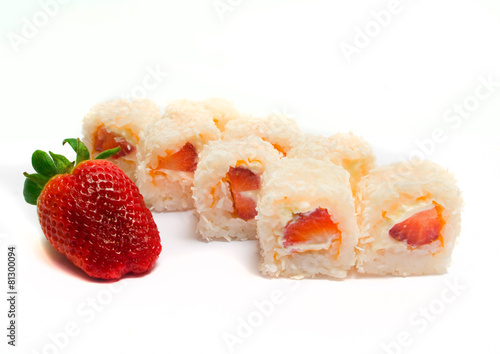 sweet sushi with coconut, strawberries and cheese
