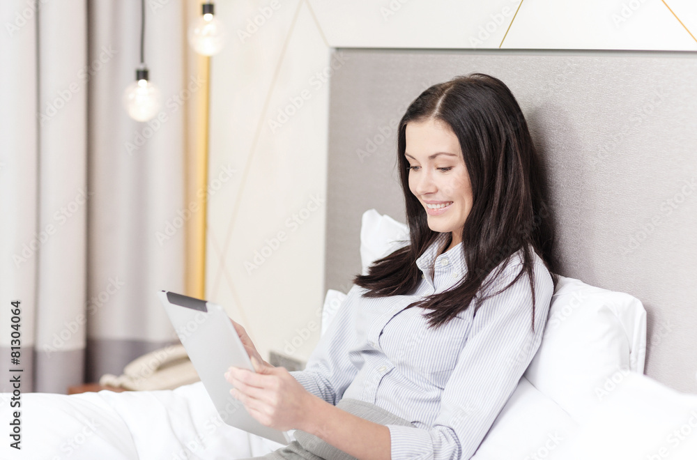happy businesswoman with tablet pc in hotel room happy businesswoman with tablet pc in hotel room