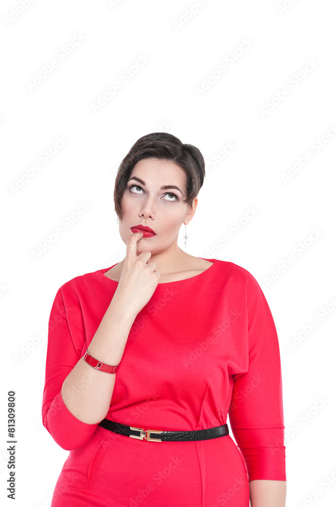 Thoughtful beautiful plus size woman looking on something up