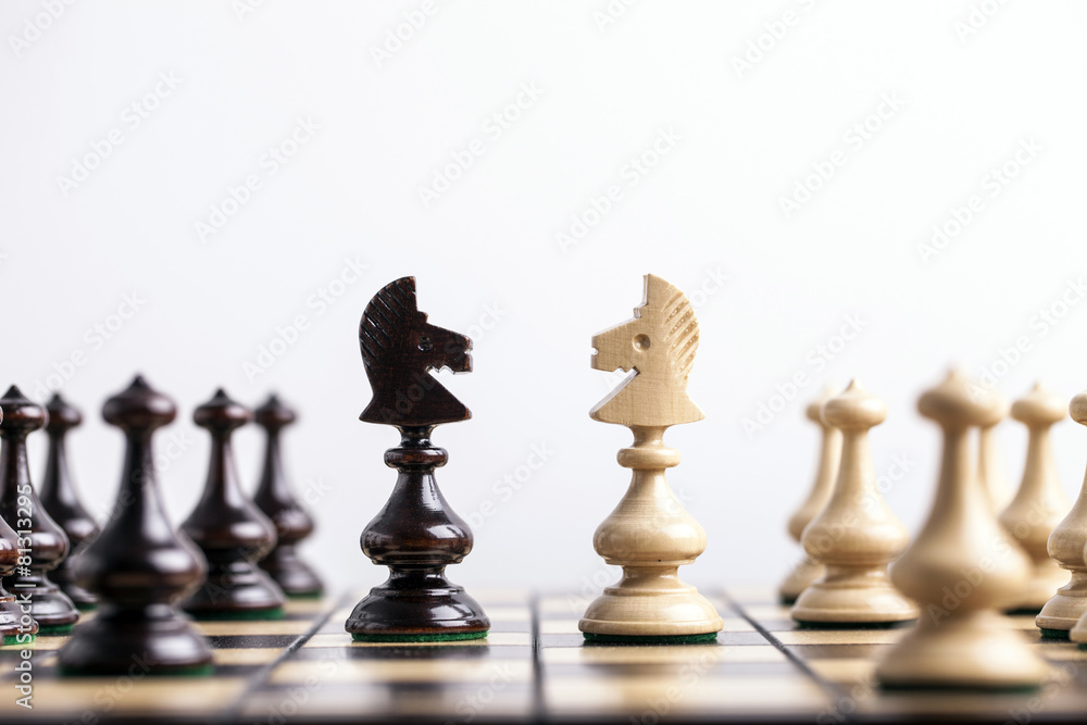 Chess pieces showing the competition, in business and game Chess pieces showing the competition, in business and game