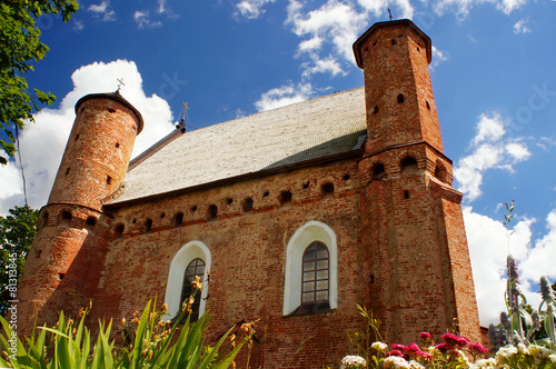 The Church of St. Michael is situated on the northern outskirts of the village of Synkavichy, Zelva District, Grodna Province, in Belarus. photo