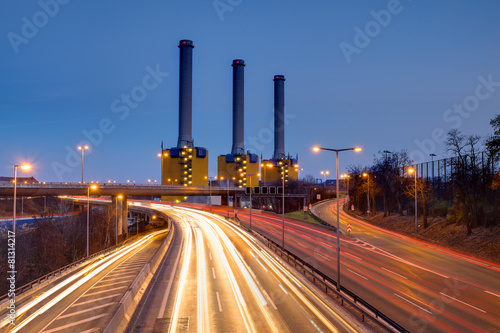 Photography Power generating plant and a highway at night