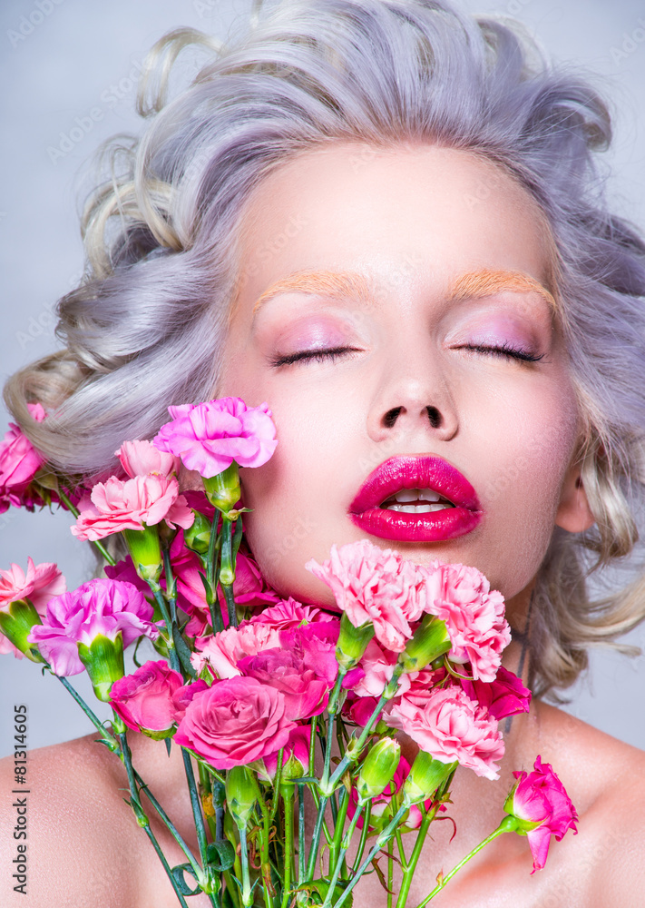 Sensual Beauty portrait of blonde pretty woman with flowers Sensual Beauty portrait of blonde pretty woman with flowers