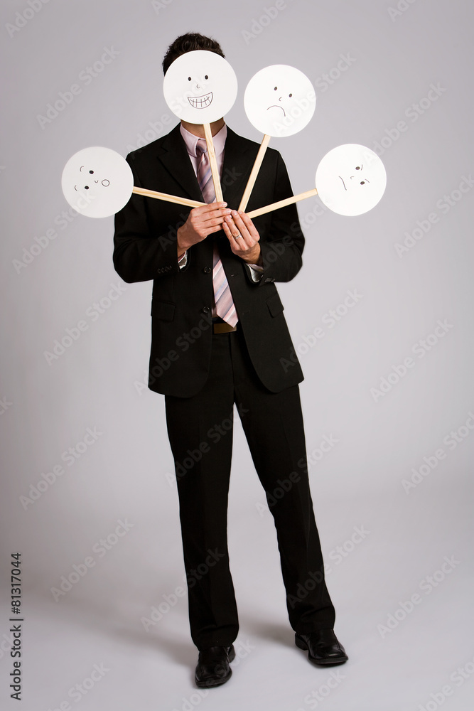 Disguise: Businessman Hiding Behind Variety Of Masks Disguise: Businessman Hiding Behind Variety Of Masks