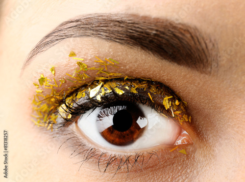 Female eye with fancy glitt...
