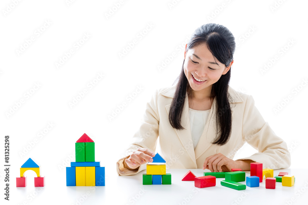 asian businesswoman with building block asian businesswoman with building block