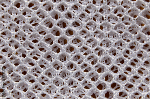 fibers of white fabric.