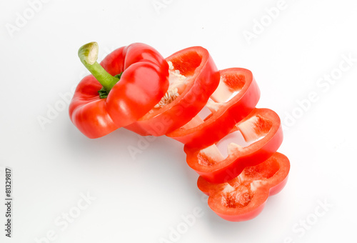 Red bell pepper slice on white background