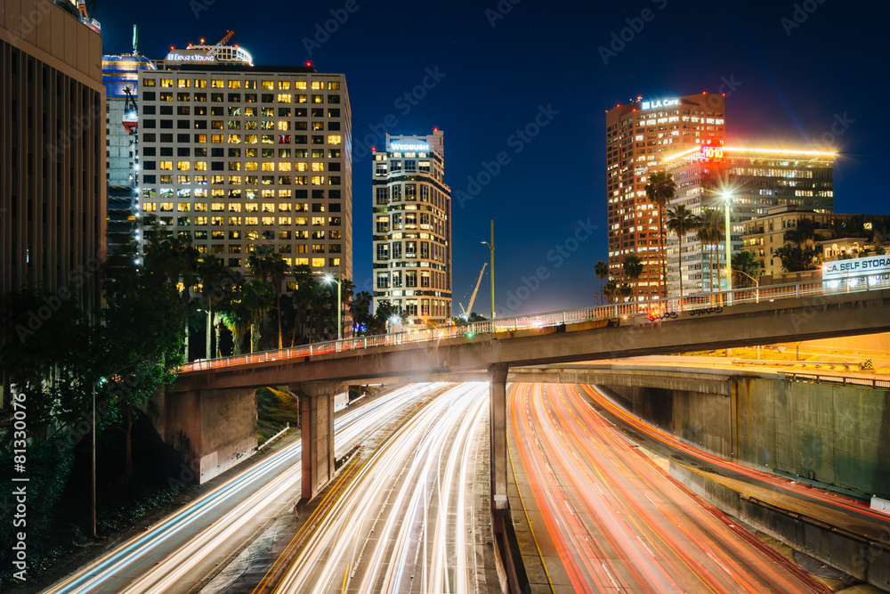 Traffic on the 110 Freeway and buildings in Los Angeles at night Traffic on the 110 Freeway and buildings in Los Angeles at night