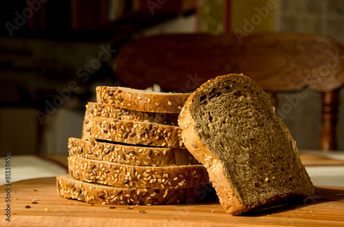 Fresh whole wheat bread on a wooden photo
