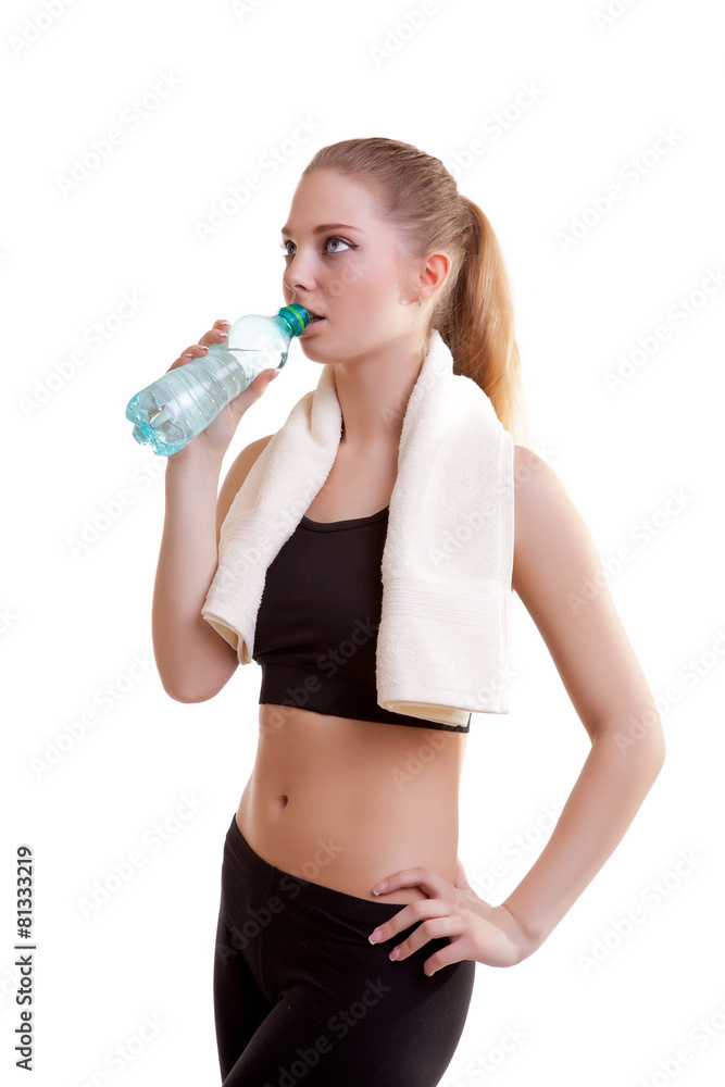 Girl after training drinking water Girl after training drinking water