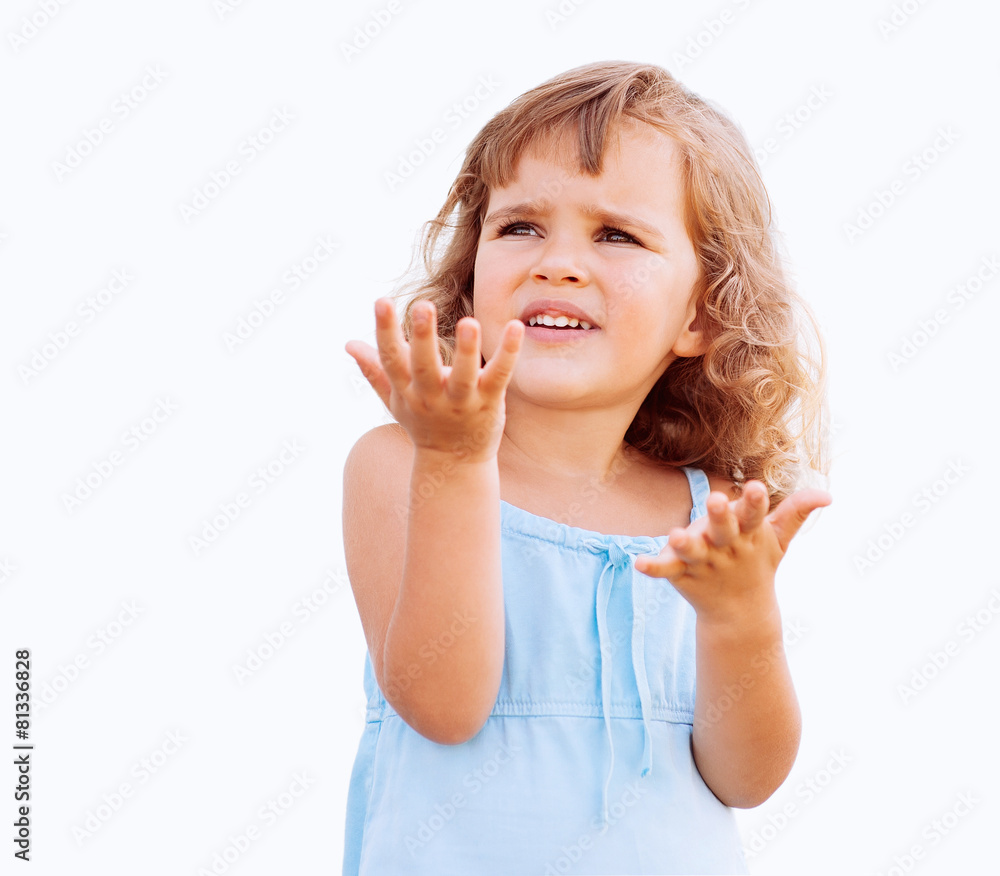 Curly little girl showing copy space Curly little girl showing copy space