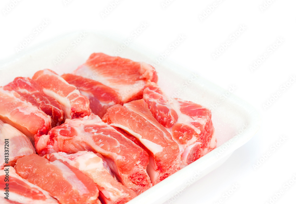 pork sparerib raw in tray foam isolated on white background